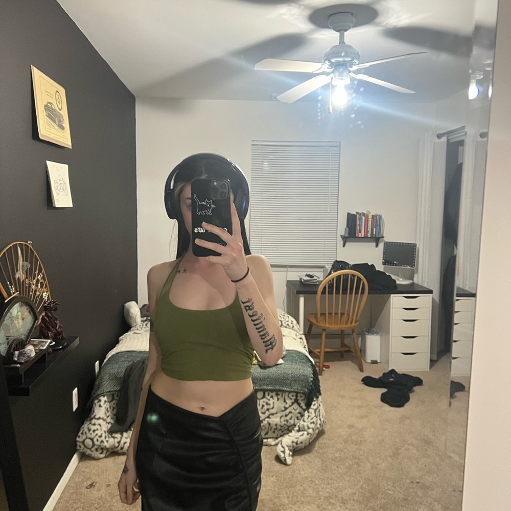 green workout top with built in bra
